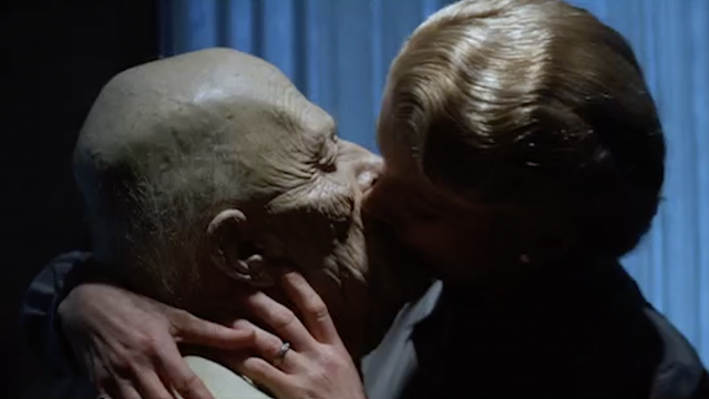 Catherine Deneuve kisses an extremely old and unrecognizable David Bowie in The Hunger.